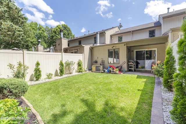 48 Carmel Ct, Old Bridge, NJ 08857 - back of house with a patio area