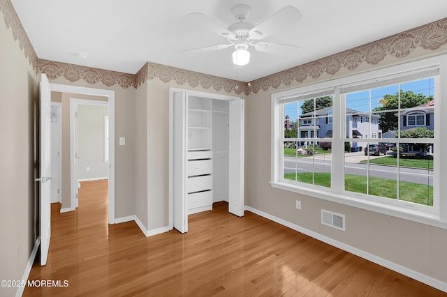 305 11th Ave, Spring Lake Heights, NJ 07762 - unfurnished bedroom with light wood-style floors, a closet, and a ceiling fan