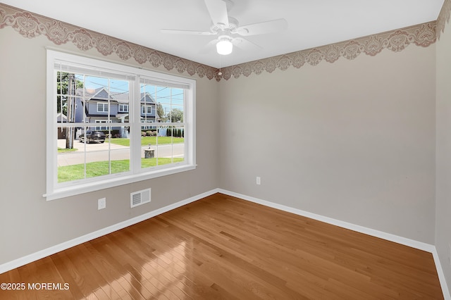 305 11th Ave, Spring Lake Heights, NJ 07762 - spare room featuring wood finished floors and ceiling fan