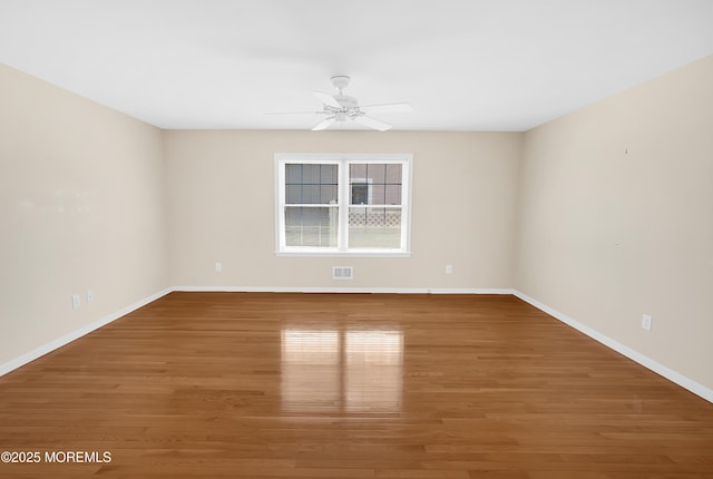 305 11th Ave, Spring Lake Heights, NJ 07762 - spare room featuring wood finished floors and a ceiling fan