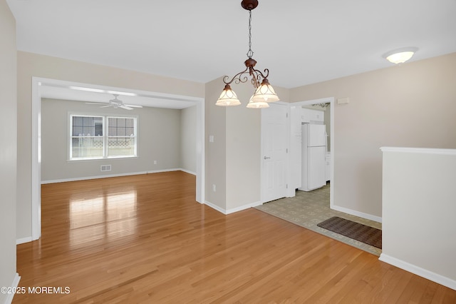 305 11th Ave, Spring Lake Heights, NJ 07762 - empty room with light wood-style floors and a ceiling fan