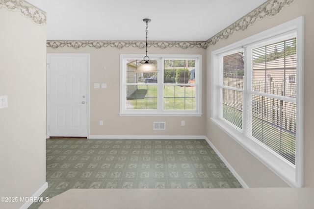 305 11th Ave, Spring Lake Heights, NJ 07762 - unfurnished dining area with plenty of natural light