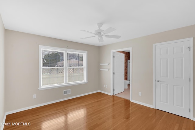 305 11th Ave, Spring Lake Heights, NJ 07762 - unfurnished bedroom featuring light wood-type flooring and ensuite bathroom
