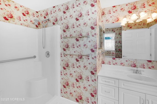 305 11th Ave, Spring Lake Heights, NJ 07762 - full bathroom featuring wallpapered walls, vanity, and a shower