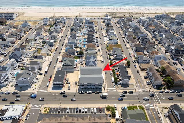 26 9th Ave Unit 105, Ortley Beach, NJ 08751 - aerial view of property and surrounding area featuring waterfront with a beach