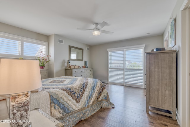 26 9th Ave Unit 105, Ortley Beach, NJ 08751 - bedroom with wood finished floors and a ceiling fan