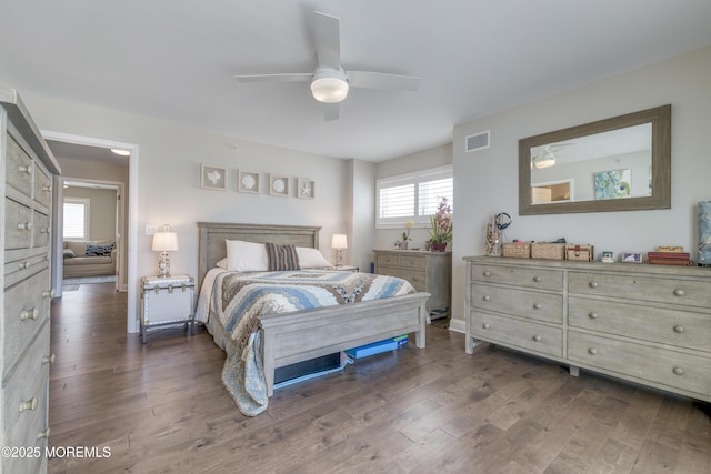 26 9th Ave Unit 105, Ortley Beach, NJ 08751 - bedroom with dark wood finished floors and ceiling fan
