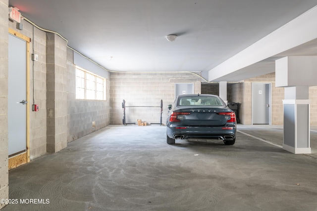 26 9th Ave Unit 105, Ortley Beach, NJ 08751 - garage with concrete block wall