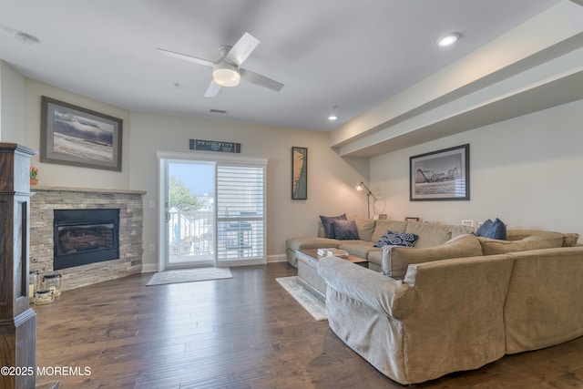 26 9th Ave Unit 105, Ortley Beach, NJ 08751 - living room with dark wood finished floors, a stone fireplace, ceiling fan, and recessed lighting