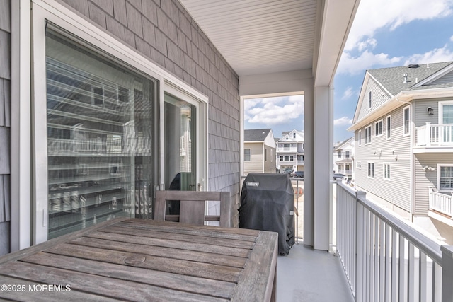 26 9th Ave Unit 105, Ortley Beach, NJ 08751 - balcony featuring a grill and a residential view
