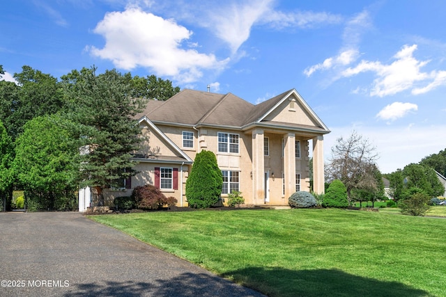 2 Muirwood Ct, Jackson, NJ 08527 - neoclassical home with a front lawn and stucco siding
