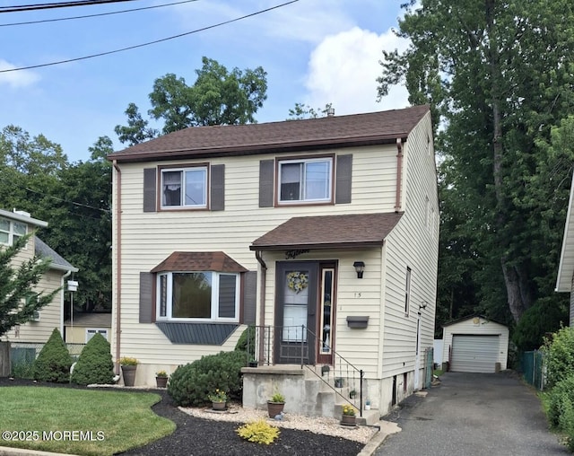 15 Tiensch Ave, Leonardo, NJ 07737 - view of front of house featuring asphalt driveway, an outdoor structure, a garage, and a shingled roof