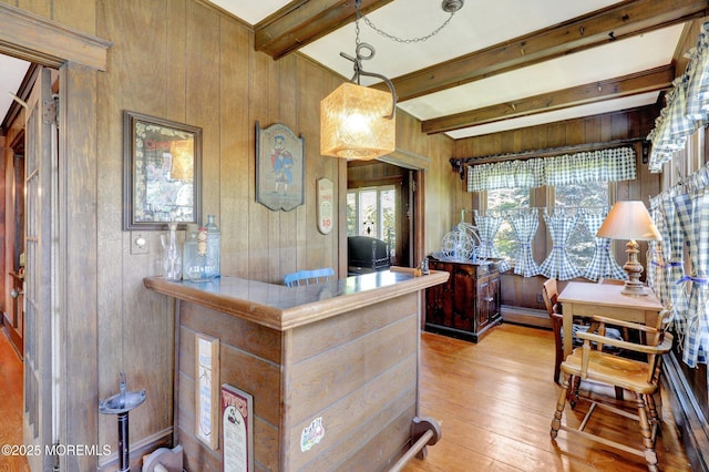 18 Holly St, Rumson, NJ 07760 - office area with beamed ceiling, light wood finished floors, wood walls, and a baseboard heating unit