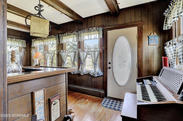 18 Holly St, Rumson, NJ 07760 - entrance foyer featuring wooden walls, beamed ceiling, and light wood finished floors