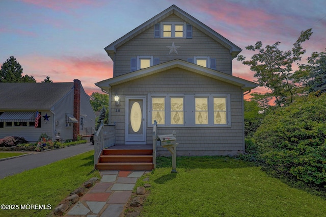 18 Holly St, Rumson, NJ 07760 - view of front facade with a yard