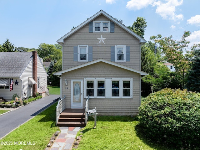 18 Holly St, Rumson, NJ 07760 - american foursquare style home featuring a front yard