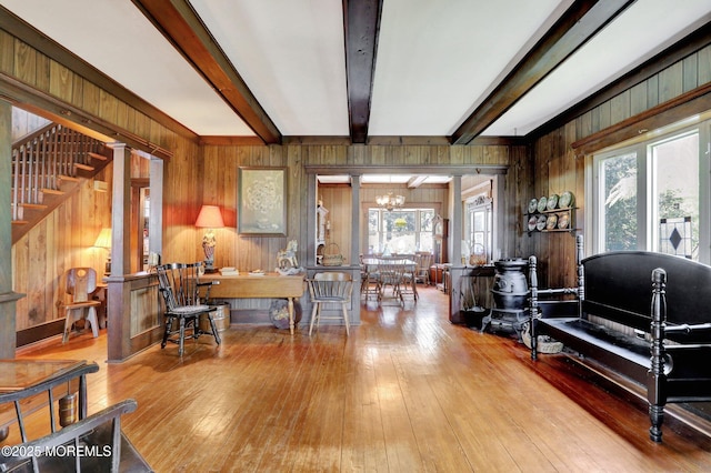 18 Holly St, Rumson, NJ 07760 - sitting room featuring plenty of natural light, beamed ceiling, a chandelier, hardwood / wood-style floors, and wooden walls