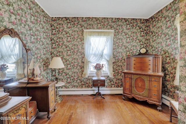 18 Holly St, Rumson, NJ 07760 - sitting room with wood-type flooring, baseboard heating, ornamental molding, and wallpapered walls