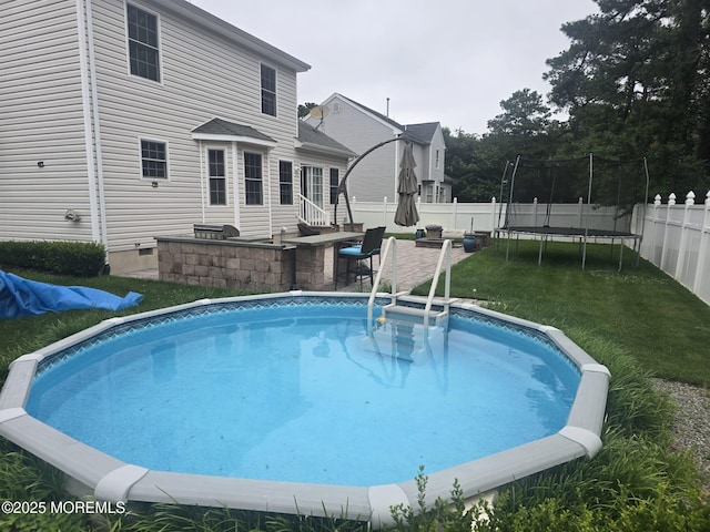 1485 Earie Way, Forked River, NJ 08731 - view of swimming pool with a trampoline, a fenced backyard, and a patio area