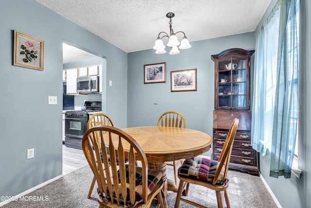 1002 Morning Glory Ct, Jackson, NJ 08527 - dining area with a textured ceiling, a chandelier, and light carpet