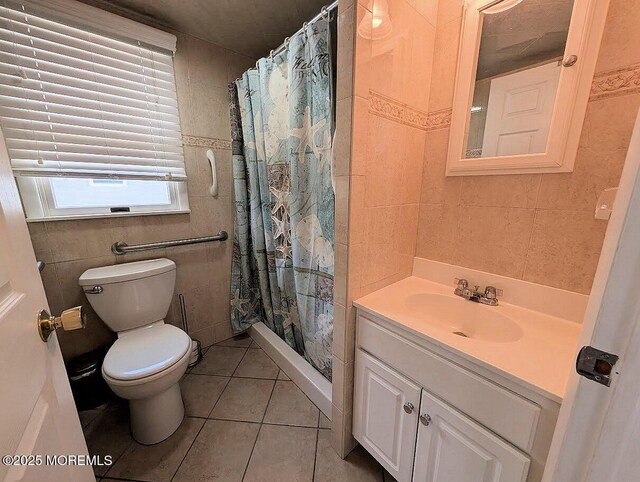 215 Harbor Dr, Lavallette, NJ 08735 - bathroom featuring tile walls, vanity, tile patterned floors, and a shower with shower curtain