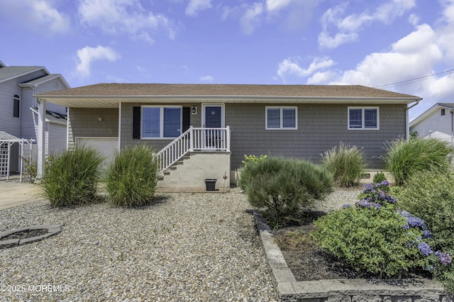 813 Tiller Dr, Forked River, NJ 08731 - ranch-style house with a shingled roof and a garage
