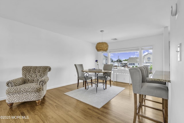 813 Tiller Dr, Forked River, NJ 08731 - dining area with light wood-style flooring and baseboards