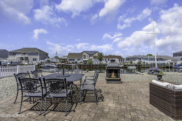 813 Tiller Dr, Forked River, NJ 08731 - view of patio / terrace featuring a residential view, a water view, and outdoor dining area