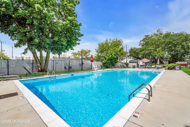 65 Cedar Ave Unit C16, Long Branch, NJ 07740 - community pool with a patio