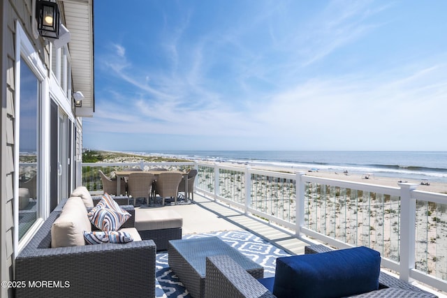 209 E 20th St, Long Beach Twp, NJ 08008 - balcony featuring an outdoor hangout area and view of water and beach