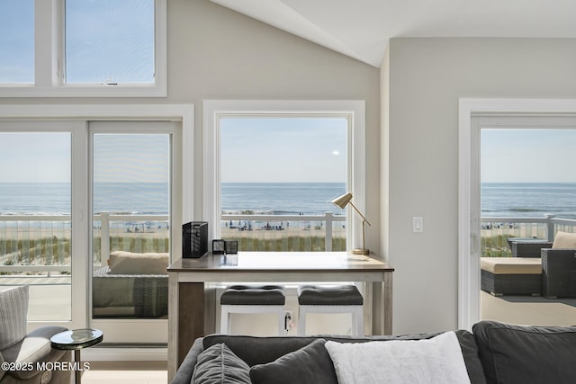 209 E 20th St, Long Beach Twp, NJ 08008 - living area with a water view and lofted ceiling
