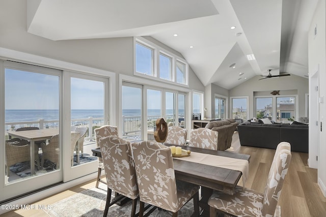 209 E 20th St, Long Beach Twp, NJ 08008 - dining room with light wood-style floors, vaulted ceiling, a water view, a ceiling fan, and recessed lighting