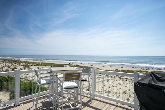 209 E 20th St, Long Beach Twp, NJ 08008 - wooden deck featuring view of water and beach and grilling area