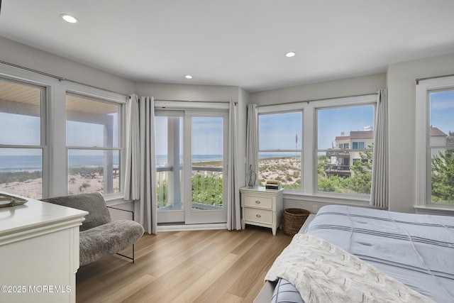 209 E 20th St, Long Beach Twp, NJ 08008 - bedroom featuring a water view, wood finished floors, and recessed lighting