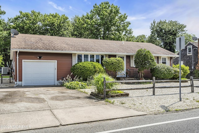 648 E Bayview Ave, Ocean Gate, NJ 08740 - ranch-style home featuring a garage, driveway, and a shingled roof