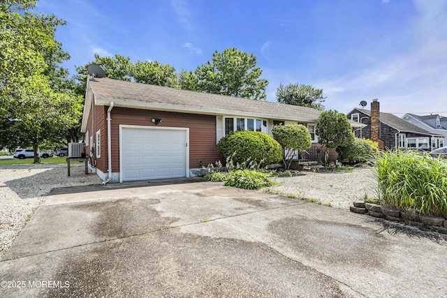 648 E Bayview Ave, Ocean Gate, NJ 08740 - ranch-style home featuring a garage, concrete driveway, and a shingled roof