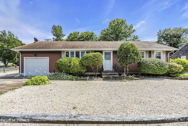 648 E Bayview Ave, Ocean Gate, NJ 08740 - ranch-style house featuring entry steps, a garage, and concrete driveway