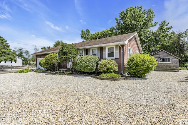 648 E Bayview Ave, Ocean Gate, NJ 08740 - single story home featuring an attached garage and an outdoor structure
