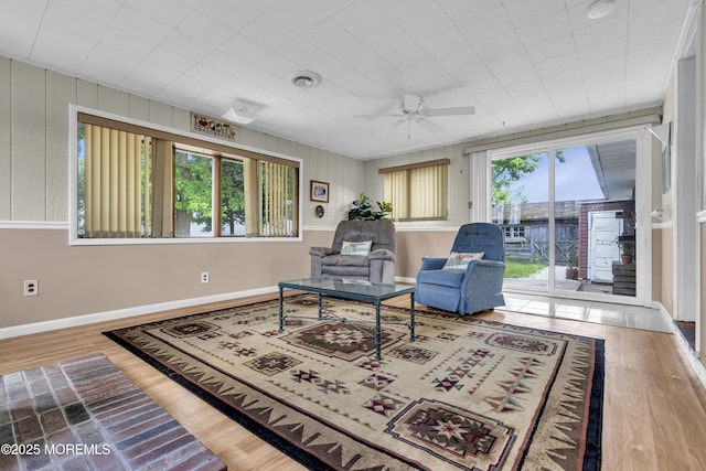 648 E Bayview Ave, Ocean Gate, NJ 08740 - living area with a ceiling fan and wood finished floors
