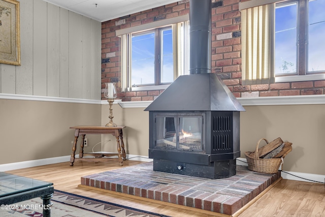648 E Bayview Ave, Ocean Gate, NJ 08740 - detailed view of a wood stove and wood finished floors