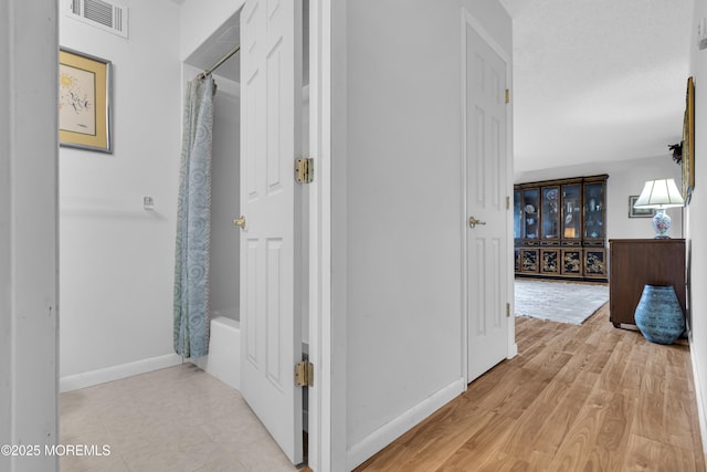 648 E Bayview Ave, Ocean Gate, NJ 08740 - hall with baseboards and light wood-style flooring