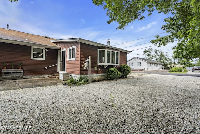 648 E Bayview Ave, Ocean Gate, NJ 08740 - view of home's exterior with entry steps