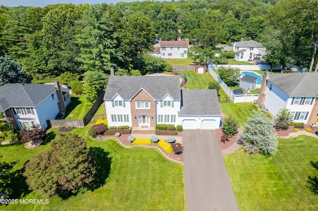 18 Rowena Rd, Manalapan, NJ 07726 - aerial view of property and surrounding area featuring a forest