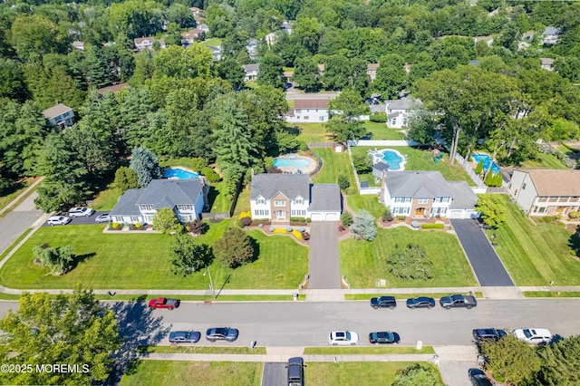 18 Rowena Rd, Manalapan, NJ 07726 - drone / aerial view of a pool