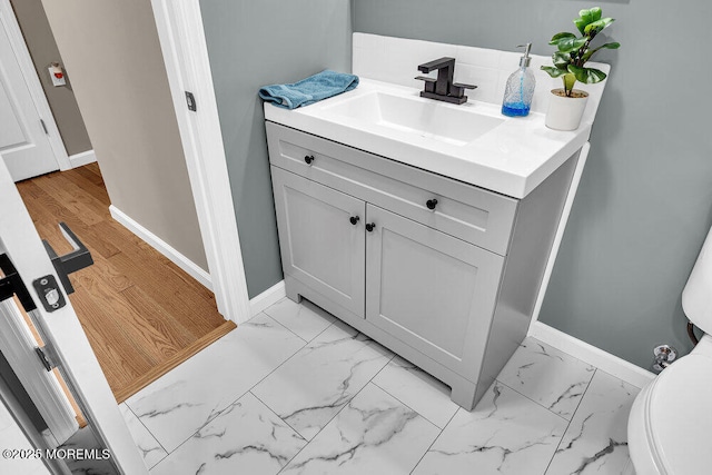 25 Montserrat St, Toms River, NJ 08757 - bathroom featuring vanity, marble look tiles, and decorative backsplash