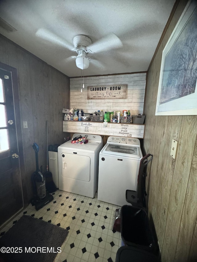 9 Winnebago Trl, Browns Mills, NJ 08015 - laundry room featuring wood walls, washing machine and clothes dryer, light flooring, ceiling fan, and a textured ceiling