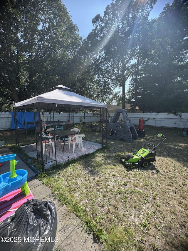 9 Winnebago Trl, Browns Mills, NJ 08015 - fenced backyard with a gazebo and a patio area