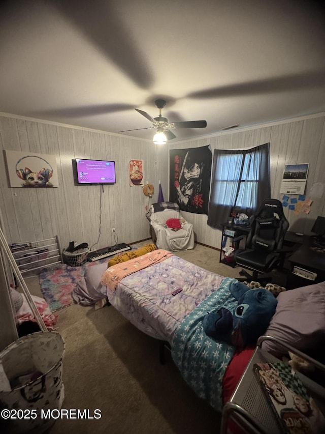 9 Winnebago Trl, Browns Mills, NJ 08015 - bedroom with carpet flooring, wooden walls, and ceiling fan