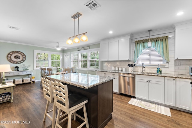 14 Campion Ct, Brick, NJ 08724 - kitchen with stainless steel dishwasher, ornamental molding, a ceiling fan, tasteful backsplash, and dark wood-type flooring