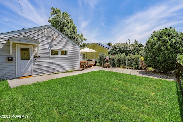 2905 Appleby Dr, Ocean Twp, NJ 07712 - view of green lawn featuring a patio